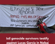 The title reads no more rivers of blood, refering to the white banner on the image that says the ixil people do have memory, there is also a red motorcycle