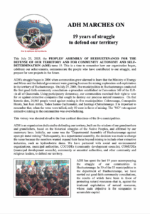Two-page white document with black text. Page 1 has circular ADH logo at top left, large heading "ADH MARCHES ON - 19 years of struggle to defend our territory," body text in paragraphs, and one outdoor crowd photo. Page 2 continues with black text paragraphs, contains indoor meeting photo with green walls, and ends with boxed slogan text and signature line.