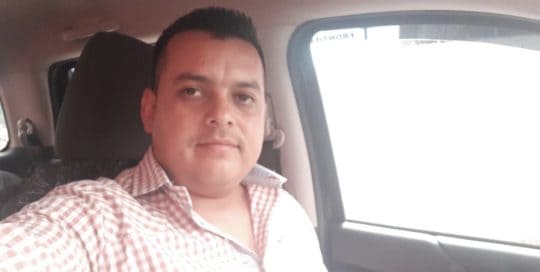 Picture of Julio in a car