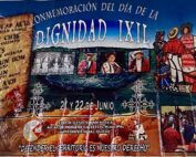 A large, colorful banner hung on a tiled ceiling, announcing the "Commemoration of the Day of Ixil Dignity." On the left side, a scroll-like graphic lists the names of the Seven Principales—Sebastián Cedillo, Pedro Guzmán, Vicente Guzmán, Juan Brito, Juan Brito Brito, Diego Cuchil, and Pedro Saloj—who were executed in 1936 for resisting forced labor. In the center and right, the banner features a collage of photographs: black-and-white images of community leaders, color portraits of people in traditional Ixil clothing, and stylized Indigenous artwork showing a group of figures in red, blue, and white garments. At the bottom, there are more event photos, maize kernels as background, and the phrase: “Defender el territorio es nuestro derecho” ("Defending the land is our right"). The banner credits the Ancestral Indigenous Municipal Authority Maya Ixil of Nebaj, Quiché, with organizing the event, held on June 21 and 22.