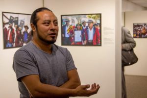 Documentary photographer Roderico Y. Diaz talks about his exhibit, “Defending Truth and Memory: The Path Towards Justice in Guatemala,” at the University Museum at Kent Hall on Feb. 1. The exhibit will be on display through June 30. (Photo by Maggie Adams / Kokopelli)