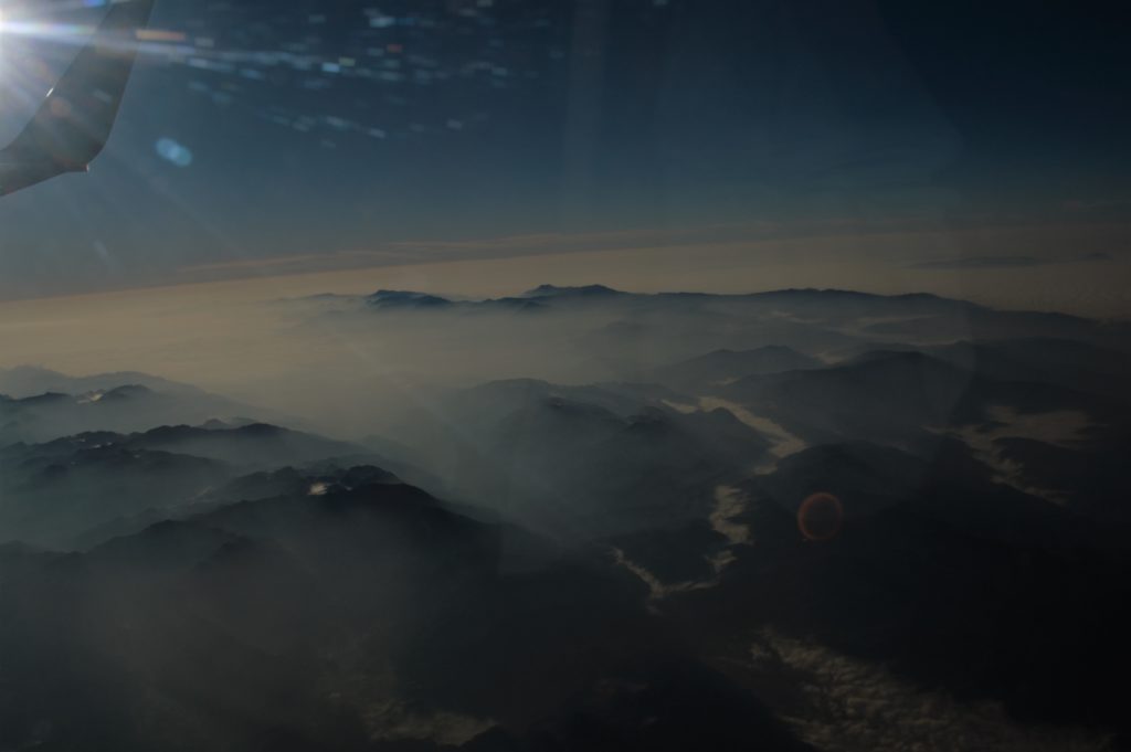 Delegate Buffy Charley captures mist-covered mountains on the flight to Guatemala City. Photo credit: Buffy Charley