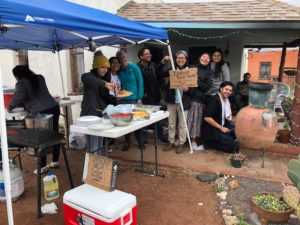 The delegates sell Navajo Tacos to fundraise for their trip expenses. Photo credit: Chantelle John